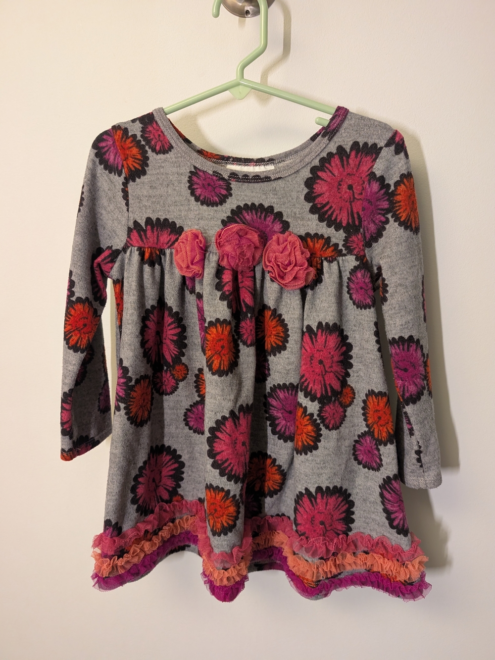 Bonnie Jean floral Long Sleeve Dress With Ruffled Hem.